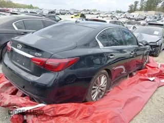 2018 Infiniti Q50 Luxe with VIN JN1EV7APXJM353659, listed as a IAAI auction lot 39289470 with 124,830 mi miles and . Bid and sale history available at DreamBid. Image 4.
