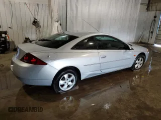 2001 Mercury Cougar z VIN 1ZWFT61LX15601779, wystawiony jako Copart lot #72073124 z przebiegiem 121 192 mil mil oraz Szkody całkowita. Historia ofert i sprzedaży dostępna na DreamBid. Obrazek 3.