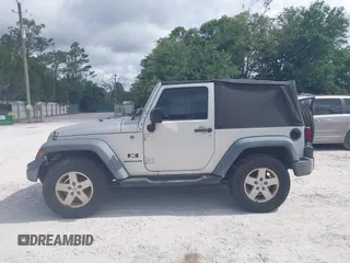 2008 Jeep Wrangler X with VIN 1J4FA24168L652177, listed as a IAAI auction lot 42284529 with 171,141 mi miles and . Bid and sale history available at DreamBid. Image 14.