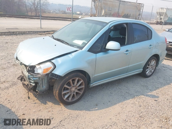2009 Suzuki SX4 Sport FWD z VIN JS2YC414996201530, wystawiony jako IAAI lot #41476333 z przebiegiem 148 263 mil mil oraz . Historia ofert i sprzedaży dostępna na DreamBid. Obrazek 2.
