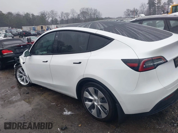 2021 Tesla Model Y Long Range with VIN 5YJYGDEEXMF228914, listed as a IAAI auction lot 41409806 with 48,276 mi miles. Bid and sale history available at carsss.com. Image 14.