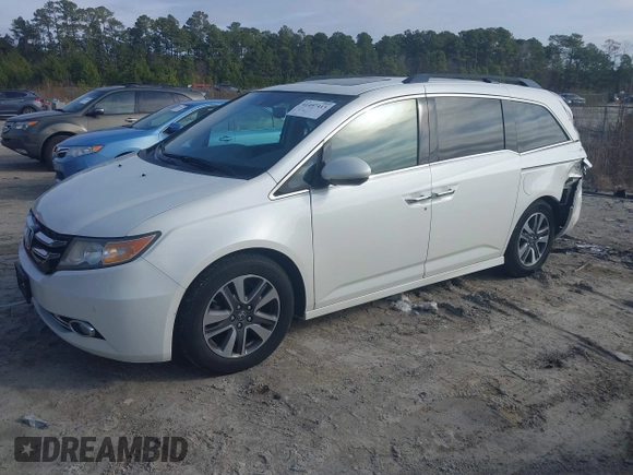 2014 Honda Odyssey Touring with VIN 5FNRL5H97EB127836, listed as a IAAI auction lot 41497413 with 174,914 mi miles and . Bid and sale history available at DreamBid. Image 17.