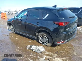 2020 Mazda CX-5 Touring with VIN JM3KFBCM5L0866189, listed as a IAAI auction lot 41829901 with 31,627 mi miles. Bid and sale history available at carsss.com. Image 3.