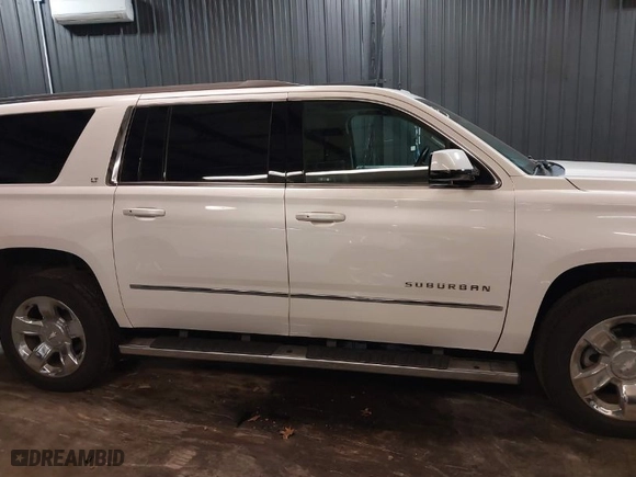 2019 Chevrolet Suburban LT with VIN 1GNSKHKC0KR211729, listed as a IAAI auction lot 41759414 with NaN miles. Bid and sale history available at carsss.com. Image 13.