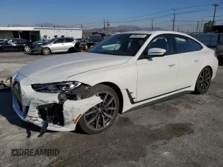 2022 BMW i4 eDrive40 with VIN WBY73AW09NFM60389, listed as a Copart auction lot 87887265 with 29,510 mi miles and Salvage Title. Bid and sale history available at carsss.com. Image 1.