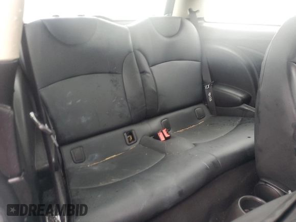 2011 MINI Hardtop with VIN WMWSU3C57BT096973, listed as a Copart auction lot 52726185 with 90,545 mi miles and Salvage title. Bid and sale history available at DreamBid. Image 10.