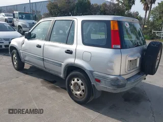 2001 Honda CR-V LX with VIN JHLRD28491S013756, listed as a IAAI auction lot 41692691 with 208,604 mi miles. Bid and sale history available at carsss.com. Image 3.