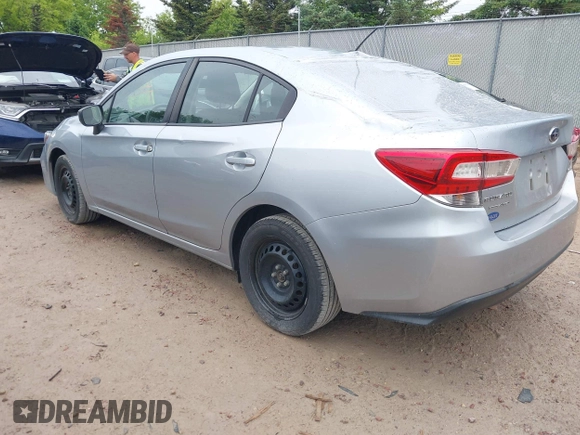 2019 Subaru Impreza with VIN 4S3GKAB60K3608733, listed as a IAAI auction lot 42361729 with 58,863 mi miles and . Bid and sale history available at DreamBid. Image 3.