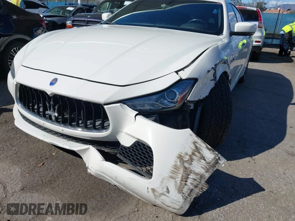 2015 Maserati Ghibli z VIN ZAM57XSA8F1161212, wystawiony jako IAAI lot #41746084 z przebiegiem 57 169 mil mil oraz . Historia ofert i sprzedaży dostępna na DreamBid. Obrazek 6.