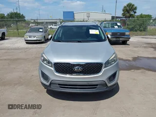 2016 Kia Sorento LX with VIN 5XYPG4A54GG009459, listed as a IAAI auction lot 42113972 with 158,950 mi miles. Bid and sale history available at carsss.com. Image 6.