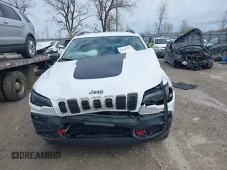 2019 Jeep Cherokee Trailhawk Elite with VIN 1C4PJMBX4KD351261, listed as a IAAI auction lot 41944727 with 97,849 mi miles. Bid and sale history available at carsss.com. Image 13.