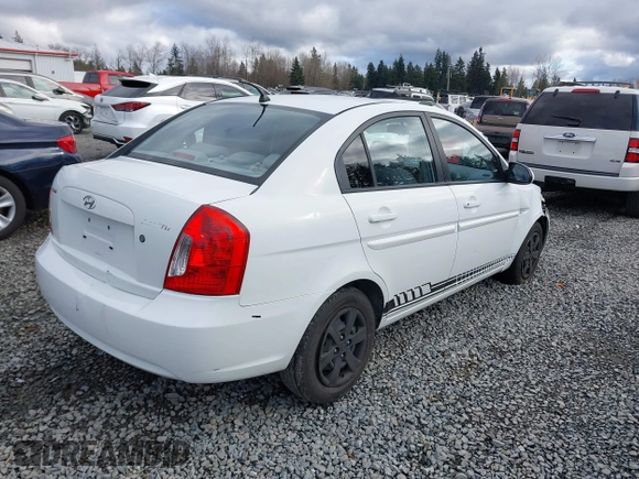 2006 Hyundai Accent GLS with VIN KMHCN46C36U009036, listed as a IAAI auction lot 41705369 with 134,328 mi miles. Bid and sale history available at carsss.com. Image 4.