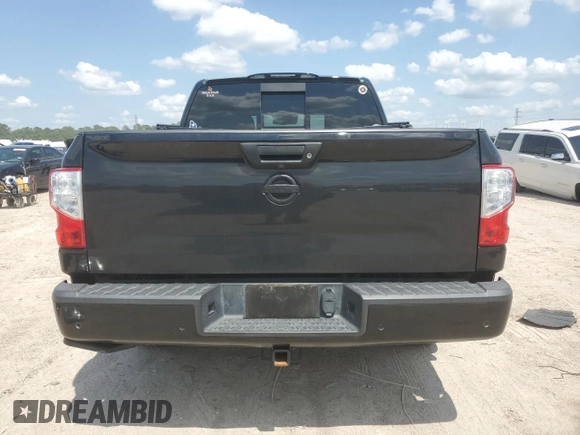 2021 Nissan Titan SV z VIN 1N6AA1EF6MN512596, wystawiony jako Copart lot #56140285 z przebiegiem 49 145 mil mil oraz Szkoda całkowita • Salvage title. Historia ofert i sprzedaży dostępna na DreamBid. Obrazek 6.