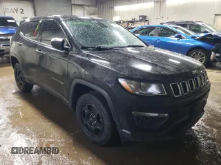2019 Jeep Compass Sport with VIN 3C4NJDAB0KT802788, listed as a Copart auction lot 39840144 with 121,229 mi miles and Salvage title. Bid and sale history available at DreamBid. Image 4.