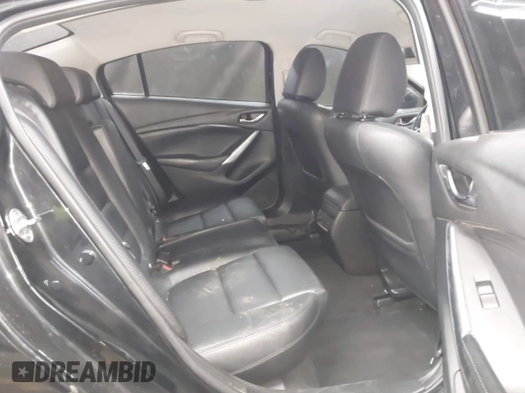 2014 Mazda Mazda6 i Touring with VIN JM1GJ1T67E1125290, listed as a IAAI auction lot 42041112 with 114,875 mi miles. Bid and sale history available at carsss.com. Image 8.
