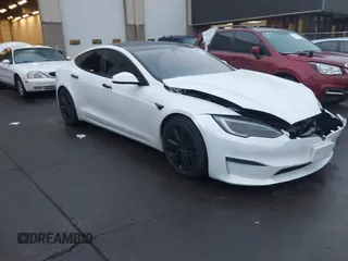 2022 Tesla Model S Plaid with VIN 5YJSA1E66NF474312, listed as a IAAI auction lot 41344937 with Not Provided miles and . Bid and sale history available at carsss.com. Image 1.