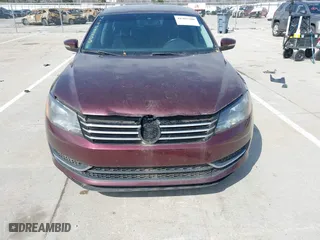 2012 Volkswagen Passat SE w/Sunroof with VIN 1VWBH7A31CC076037, listed as a IAAI auction lot 41905200 with 141,809 mi miles. Bid and sale history available at carsss.com. Image 6.