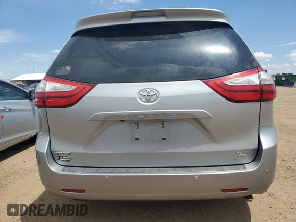 2017 Toyota Sienna XLE with VIN 5TDDZ3DC3HS177700, listed as a Copart auction lot 59720215 with 124,180 mi miles and Salvage title. Bid and sale history available at DreamBid. Image 6.