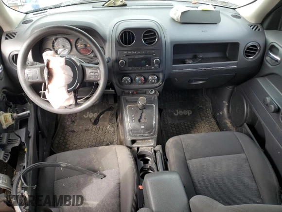 2015 Jeep Patriot High Altitude with VIN 1C4NJRAB0FD392874, listed as a Copart auction lot 52767375 with 134,522 mi miles and Salvage Title. Bid and sale history available at DreamBid. Image 8.