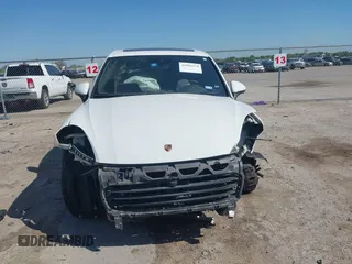 2016 Porsche Cayenne with VIN WP1AA2A29GLA04374, listed as a IAAI auction lot 41988374 with 144,716 mi miles. Bid and sale history available at carsss.com. Image 12.