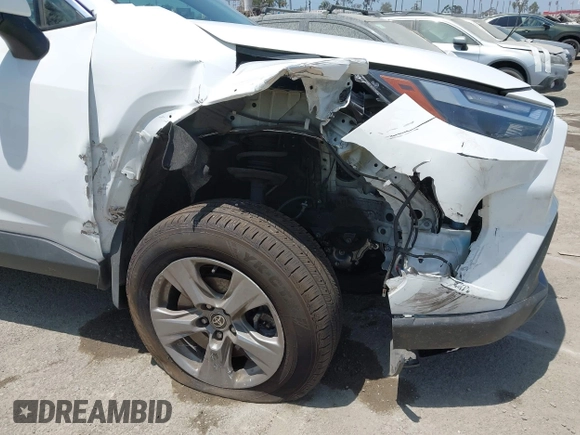 2022 Toyota RAV4 Hybrid XLE with VIN 2T3RWRFV9NW130472, listed as a IAAI auction lot 40990707 with 156,174 mi miles and . Bid and sale history available at DreamBid. Image 6.