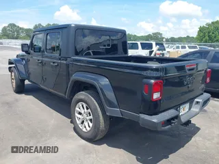 2023 Jeep Gladiator Sport S with VIN 1C6HJTAGXPL543319, listed as a IAAI auction lot 42499587 with 45,140 mi miles and . Bid and sale history available at DreamBid. Image 3.