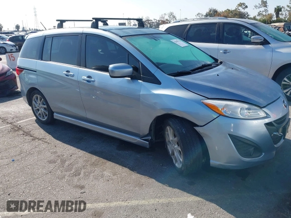 2012 Mazda 5 Grand Touring with VIN JM1CW2DL6C0126640, listed as a IAAI auction lot 42076722 with 124,412 mi miles and . Bid and sale history available at DreamBid. Image 1.