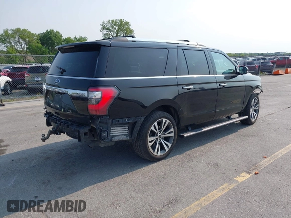 2021 Ford Expedition Max Limited with VIN 1FMJK2AT8MEA74337, listed as a IAAI auction lot 42389166 with 148,996 mi miles and . Bid and sale history available at DreamBid. Image 4.