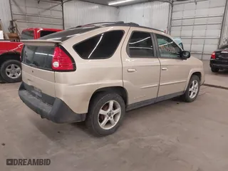 2004 Pontiac Aztek with VIN 3G7DA03E74S521297, listed as a IAAI auction lot 41905538 with 159,983 mi miles. Bid and sale history available at carsss.com. Image 4.