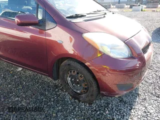 2009 Toyota Yaris with VIN JTDJT903295239611, listed as a IAAI auction lot 42216768 with 122,512 mi miles and . Bid and sale history available at DreamBid. Image 6.