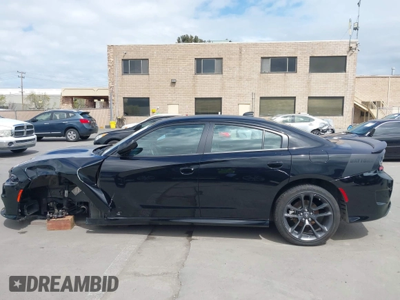 2021 Dodge Charger R/T with VIN 2C3CDXCT4MH651945, listed as a IAAI auction lot 41861896 with 25,569 mi miles and . Bid and sale history available at carsss.com. Image 14.