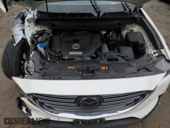 2021 Mazda CX-9 Touring with VIN JM3TCBCY1M0517709, listed as a Copart auction lot 57624945 with 64,081 mi miles and Salvage title. Bid and sale history available at DreamBid. Image 12.