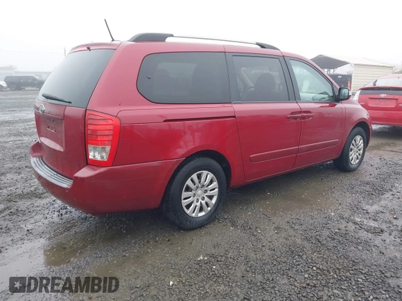 2011 Kia Sedona LX with VIN KNDMG4C71B6411453, listed as a IAAI auction lot 41316825 with 261,028 mi miles. Bid and sale history available at carsss.com. Image 4.