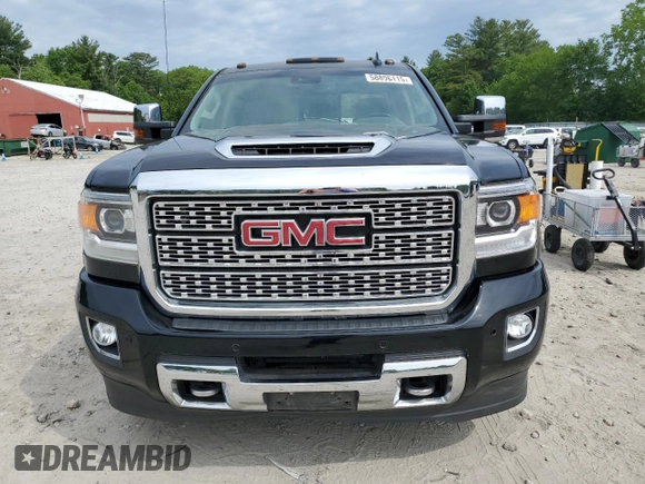 2019 GMC Sierra 3500HD Denali z VIN 1GT42WEY6KF240456, wystawiony jako Copart lot #58896115 z przebiegiem 67 144 mil mil oraz Czysty tytuł • Clean title. Historia ofert i sprzedaży dostępna na DreamBid. Obrazek 5.