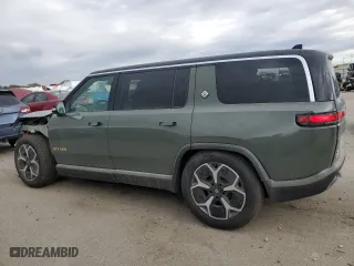 2023 Rivian R1S Launch Edition with VIN 7PDSGABL6PN022754, listed as a Copart auction lot 76849534 with 1,576 mi miles and Salvage Title. Bid and sale history available at carsss.com. Image 2.