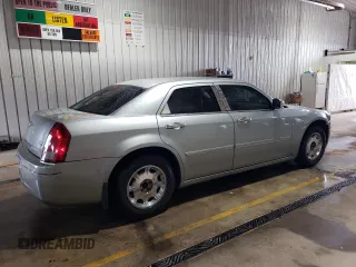 2005 Chrysler 300 with VIN 2C3JA53G65H556313, listed as a Copart auction lot 51839305 with 124,358 mi miles and Salvage Title. Bid and sale history available at carsss.com. Image 3.