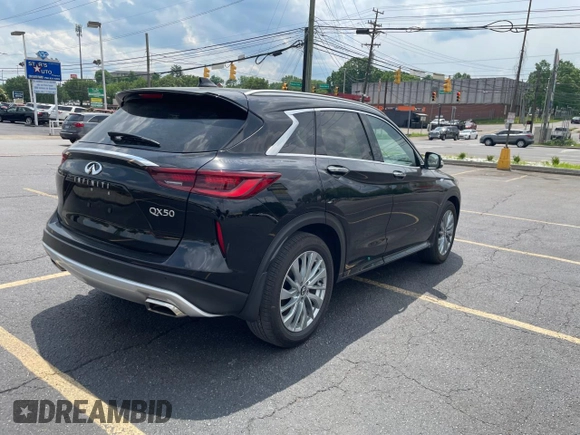 2023 Infiniti QX50 Luxe с VIN 3PCAJ5BA0PF108571, выставлен на аукционе Copart как лот 55844335 с пробегом 14 488 миль миль и Списание • Salvage title. История ставок и продаж доступна на DreamBid. Изображение 4.
