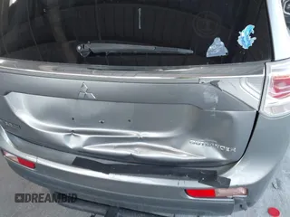 2014 Mitsubishi Outlander SE z VIN JA4AD3A32EZ011176, wystawiony jako IAAI lot #42336692 z przebiegiem 145 492 mil mil oraz . Historia ofert i sprzedaży dostępna na DreamBid. Obrazek 12.
