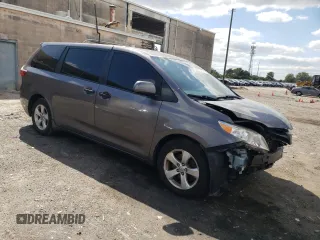 2019 Toyota Sienna L with VIN 5TDZZ3DC8KS006907, listed as a Copart auction lot 70310274 with 73,234 mi miles and Salvage Title. Bid and sale history available at carsss.com. Image 4.
