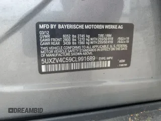 2012 BMW X5 35i with VIN 5UXZV4C59CL991689, listed as a Copart auction lot 64022615 with 208,620 mi miles and Salvage title. Bid and sale history available at DreamBid. Image 13.