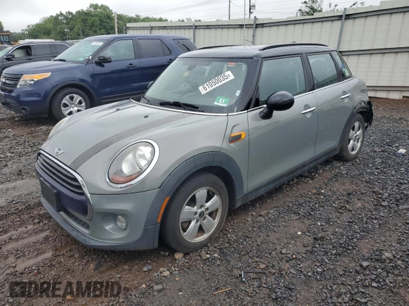 2016 MINI Hardtop 4 Door with VIN WMWXU1C53G2D08231, listed as a Copart auction lot 61050035 with 128,267 mi miles and Salvage title. Bid and sale history available at DreamBid. Image 1.