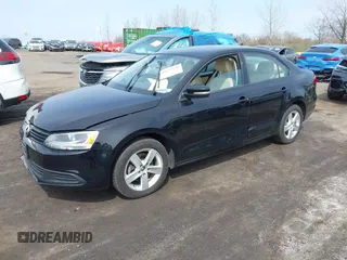 2012 Volkswagen Jetta Sedan TDI w/Premium & Nav with VIN 3VWLL7AJXCM026589, listed as a IAAI auction lot 41870945 with 72,544 mi miles. Bid and sale history available at carsss.com. Image 2.