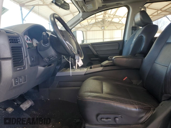 2010 Nissan Titan LE with VIN 1N6BA0EC2AN318776, listed as a Copart auction lot 46702485 with 111,149 mi miles and Salvage Title. Bid and sale history available at carsss.com. Image 7.