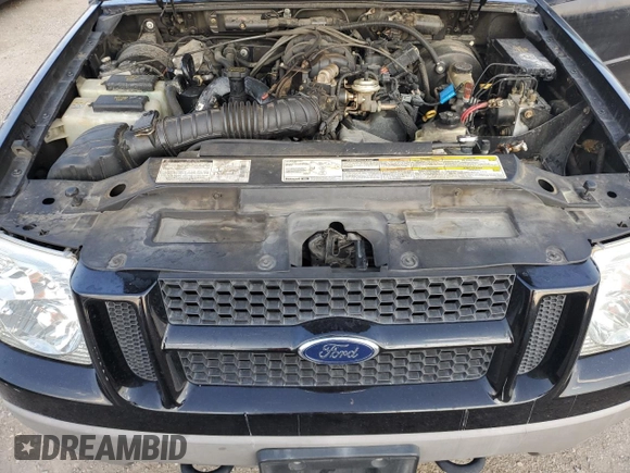 2002 Ford Explorer Sport Value z VIN 1FMYU60EX2UB70105, wystawiony jako Copart lot #64927084 z przebiegiem 91 470 mil mil oraz Czysty tytuł • Clean title. Historia ofert i sprzedaży dostępna na DreamBid. Obrazek 12.
