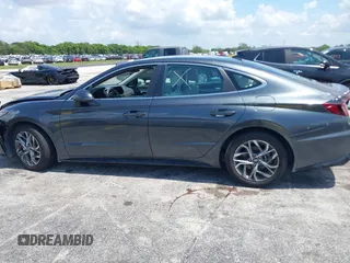 2023 Hyundai Sonata SEL z VIN KMHL64JA3PA277025, wystawiony jako IAAI lot #42301657 z przebiegiem 38 378 mil mil oraz . Historia ofert i sprzedaży dostępna na DreamBid. Obrazek 13.