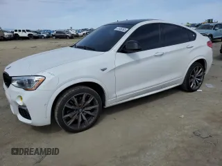 2018 BMW X4 M40i with VIN 5UXXW7C57J0W63952, listed as a Copart auction lot 47435363 with 67,198 mi miles. Bid and sale history available at carsss.com. Image 1.