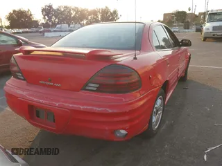2001 Pontiac Grand Am SE1 with VIN 1G2NF52T91M570800, listed as a IAAI auction lot 41307660 with 180,401 mi miles. Bid and sale history available at carsss.com. Image 4.