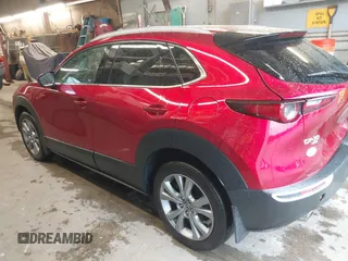 2023 Mazda CX-30 S Premium with VIN 3MVDMBDM5PM518612, listed as a IAAI auction lot 42219265 with 29,135 mi miles and . Bid and sale history available at DreamBid. Image 3.