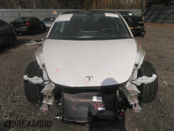 2020 Tesla Model 3 Standard Range Plus with VIN 5YJ3E1EA4LF792830, listed as a IAAI auction lot 41852919 with 76,461 mi miles. Bid and sale history available at carsss.com. Image 12.