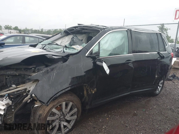 2021 Honda Pilot EX-L with VIN 5FNYF6H59MB021022, listed as a IAAI auction lot 42713636 with Not provided miles and . Bid and sale history available at DreamBid. Image 14.